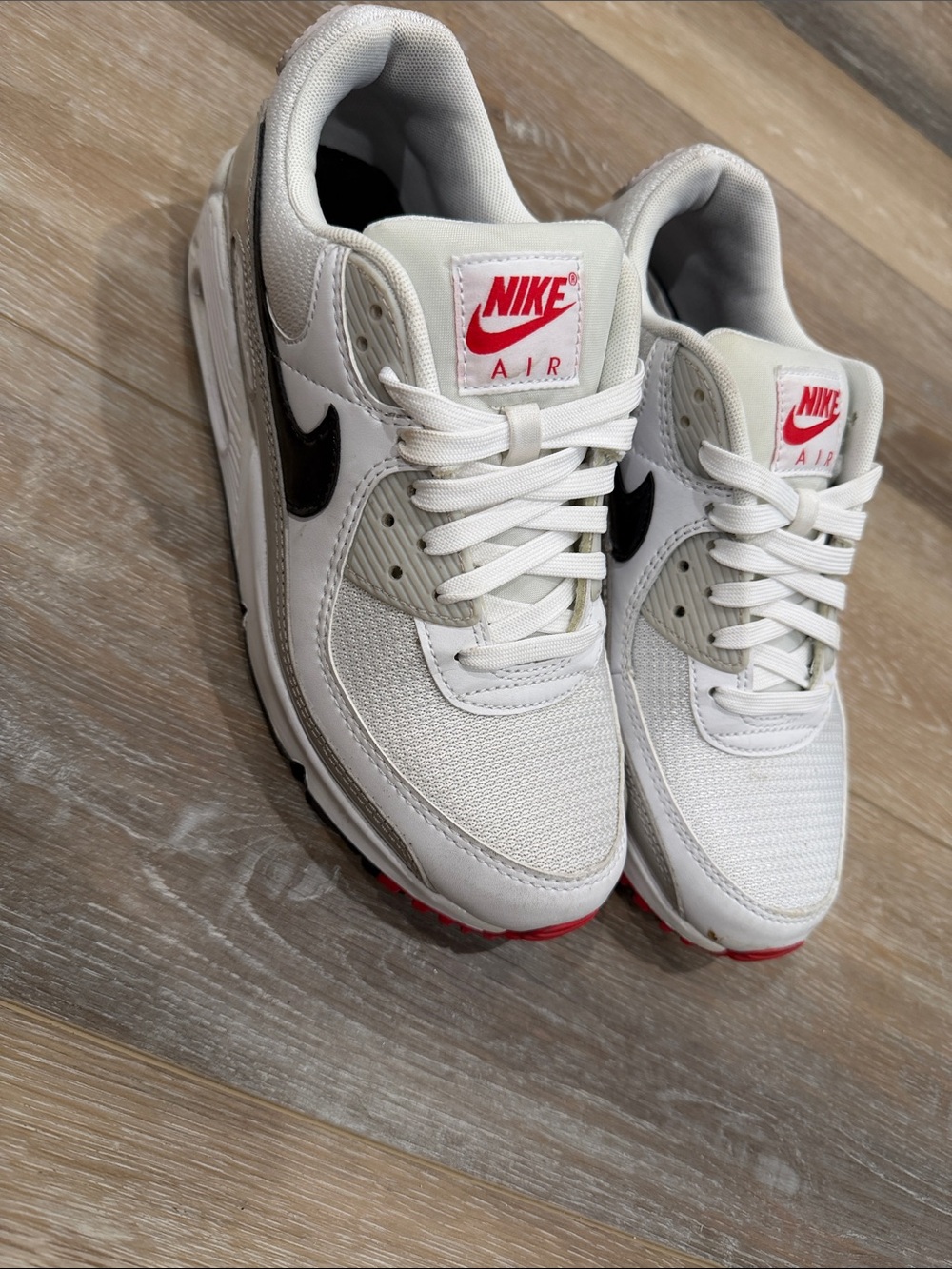 Nike White and Black Low-Top Sneakers with Red Insole Logo